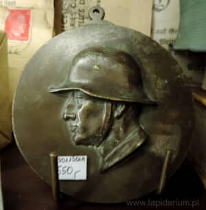 Oryginalna plakieta z brązu z wizerunkiem niemieckiego żołnierza w hełmie z okresu I wojny światowej