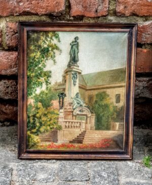 Obraz olejny Bieńkuńskiego z 1989 roku przedstawiający pomnik Adama Mickiewicza w Warszawie, oprawiony w drewnianą ramę.