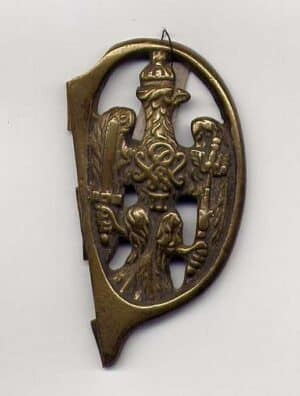 Element rękojeści pałasza pruskiego z XIX wieku z rytowanym orłem i inicjałami FW