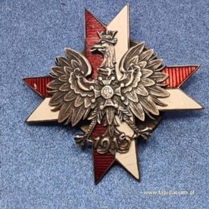 Odznaka pamiątkowa 1 Pułku Ułanów Krechowieckich - krzyż z amarantowo-białych proporczyków z srebrnym orłem Virtuti Militari