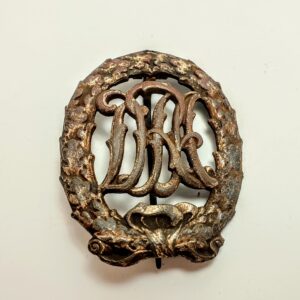 Brązowa niemiecka odznaka sportowa DRA z wieńcem dębowym i splecionym monogramem, lata 1913-1933.