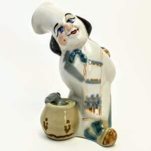Porcelanowa figurka kucharza z kotem w garnku, ręcznie malowana, złocenia – ZSRR Połonne, PRL vintage