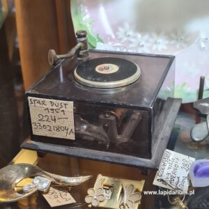 Stara, mosiężna pozytuwka reklamowa ze Stanów Zjednoczonych, przedmiot vintage.