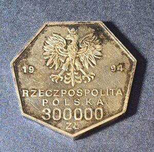 Srebrna moneta kolekcjonerska 300 000 zł 1994 z okazji 70-lecia odrodzenia Banku Polskiego, srebro 999, kształt siedmiokątny